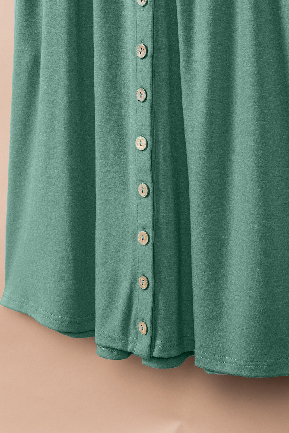 Mini-robe boutonnée taille haute sans manches verte