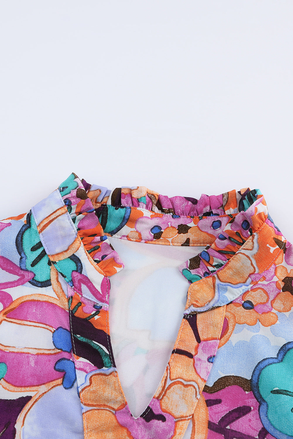 Mini-robe multicolore à imprimé floral et col en V à manches bouffantes