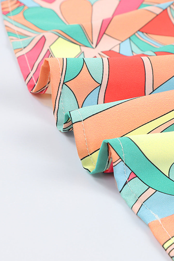 Robe évasée multicolore à imprimé géométrique abstrait et pampilles