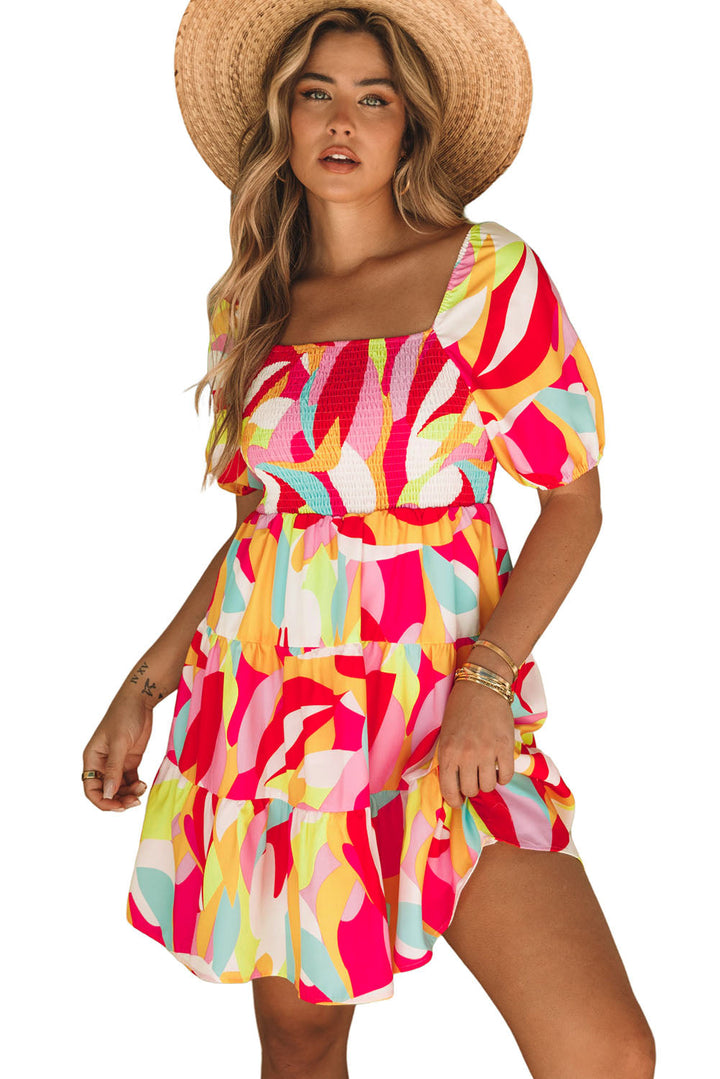 Mini-robe nuisette smockée à imprimé géométrique multicolore